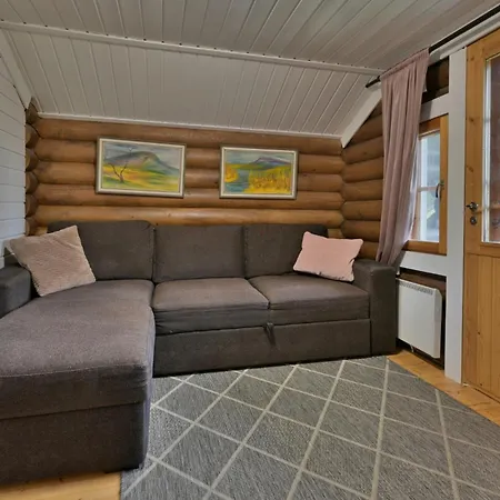 Log Otsonpesae With Lappish Hut Chalet